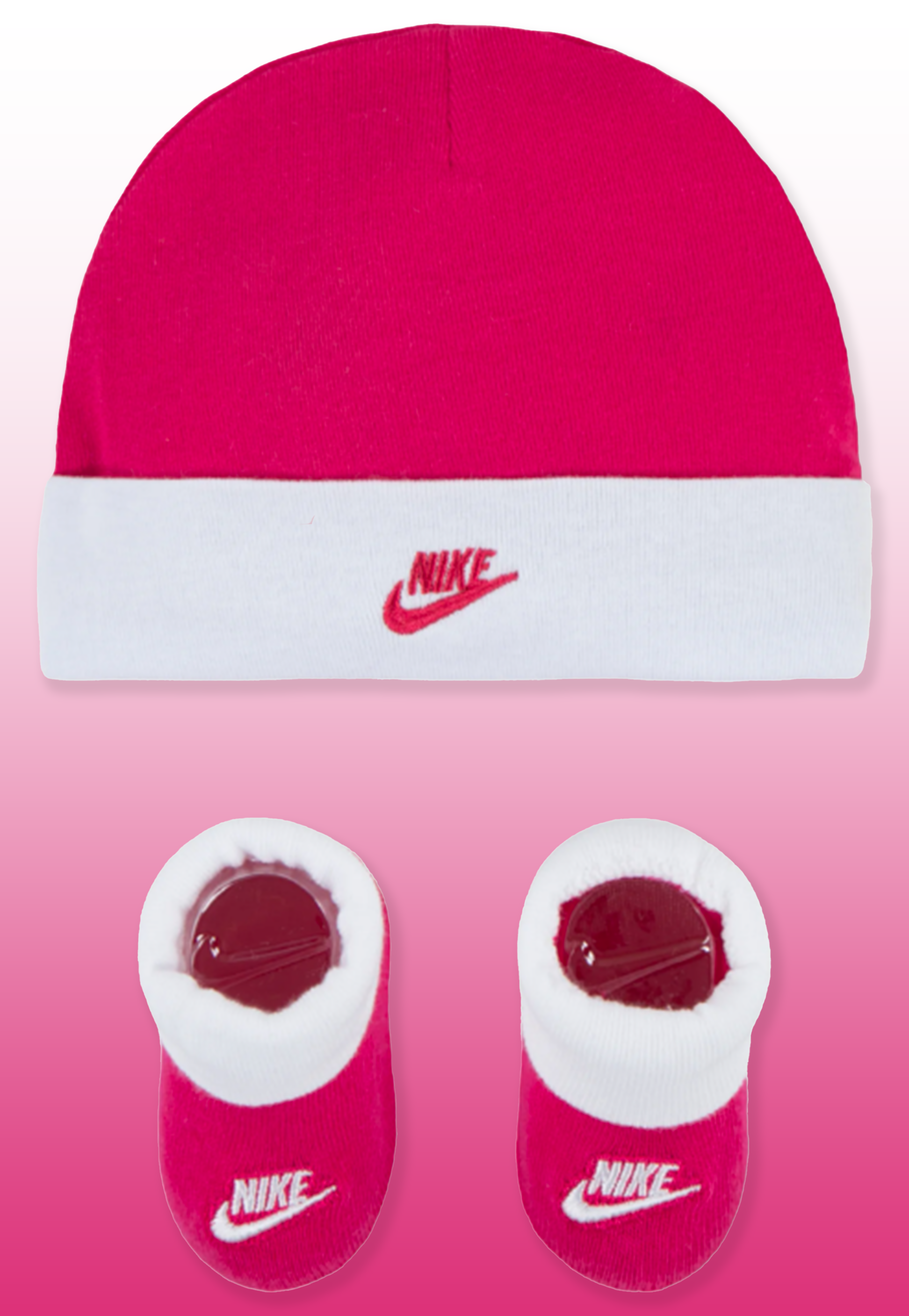 Nike set regalo neonato composto da 2 pezzi: cappellino e scarpine in cotone. Colorazione bianco e fucsia